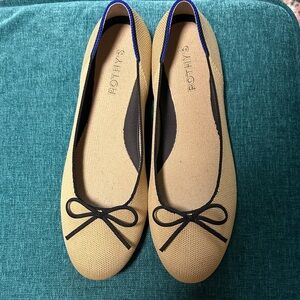 Rothy's Beige Flats with Black bow